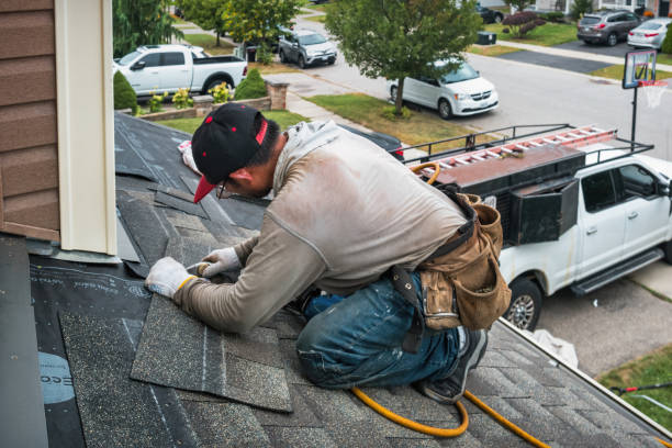 Professional Roofing technician working in Little Compton, RI